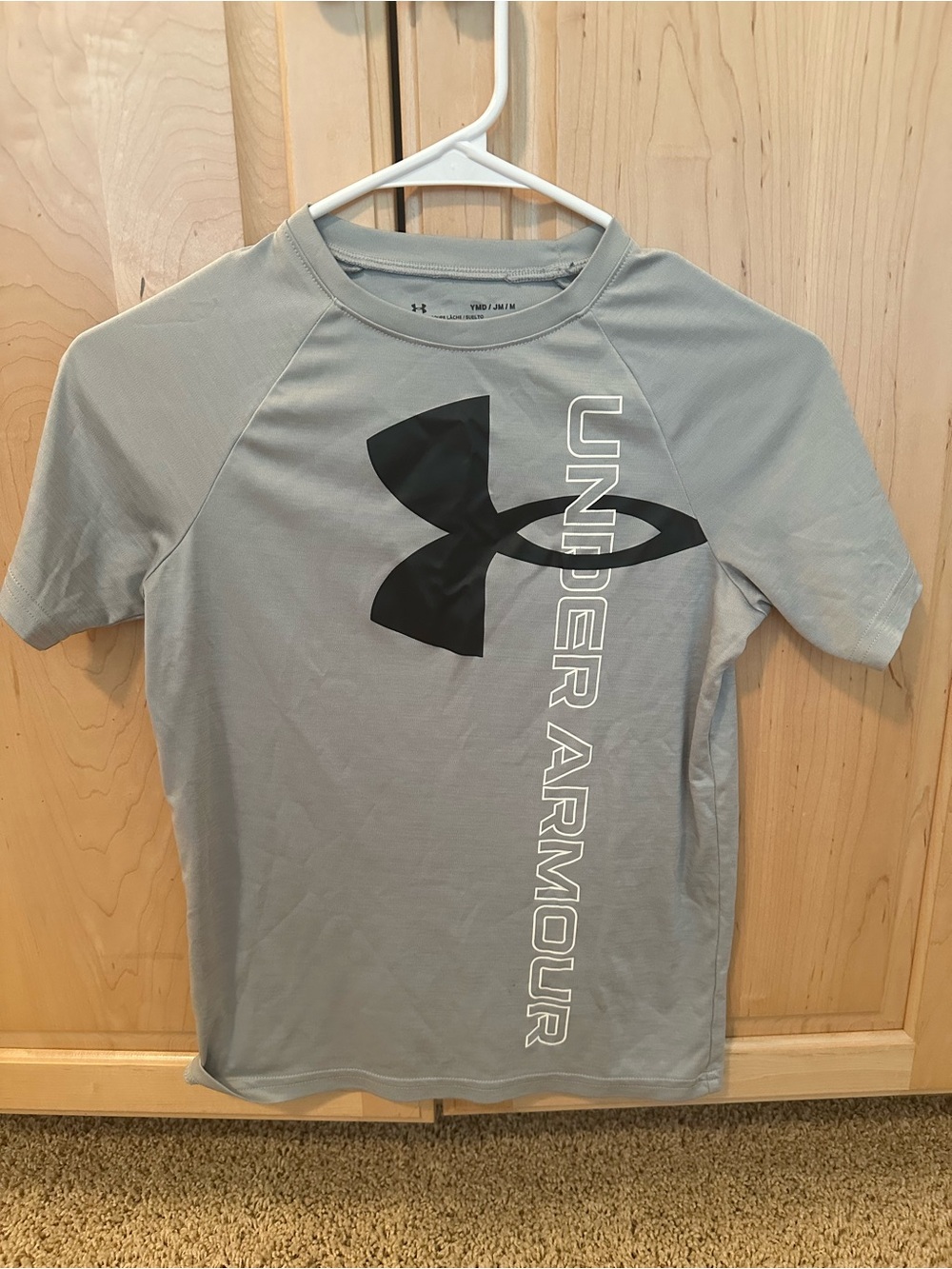 Under Armour Light Gray Short Sleeve Tee with Black Logo and Vertical Text